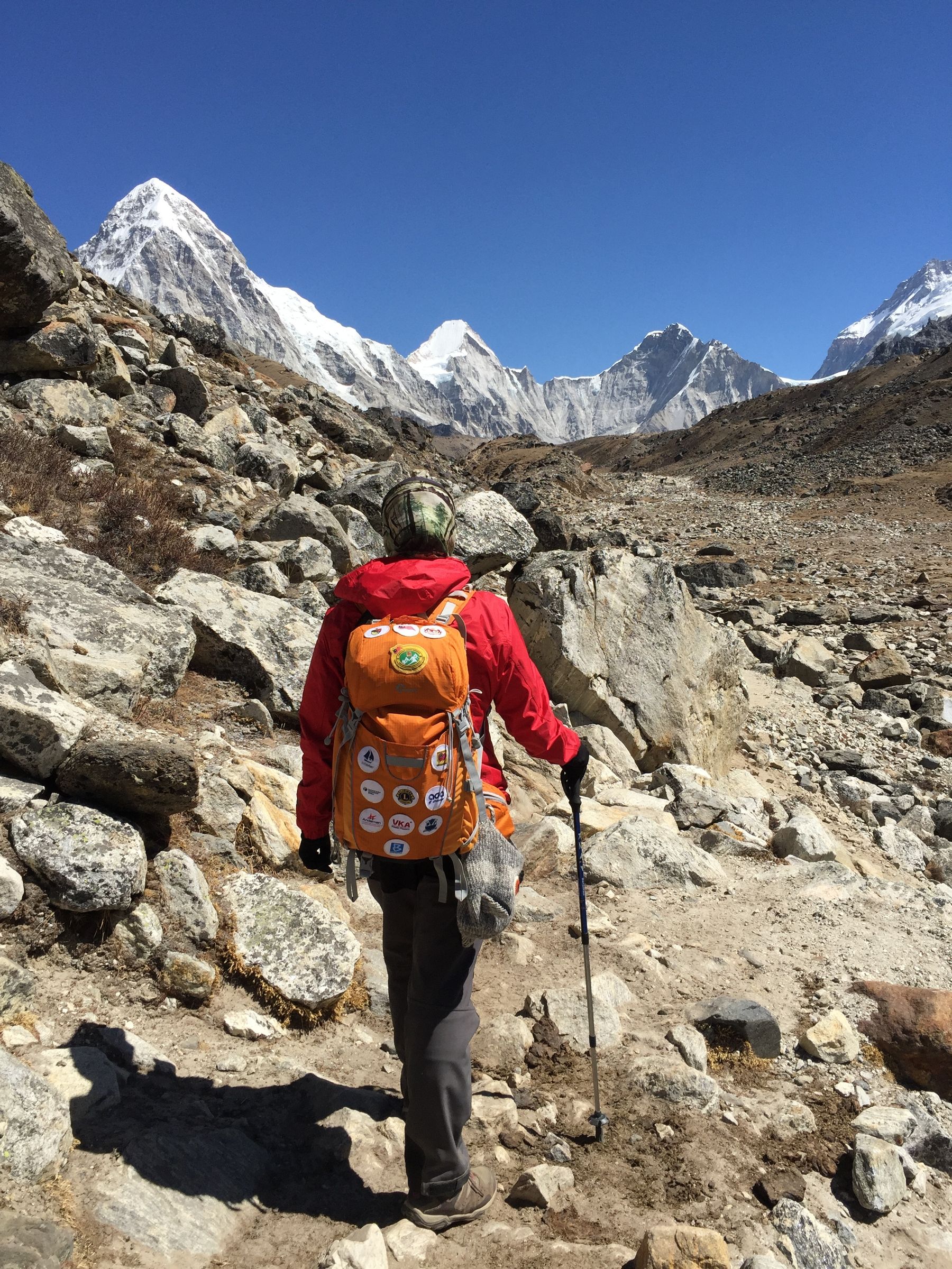 Trekker and snow mountains in the Himalaya